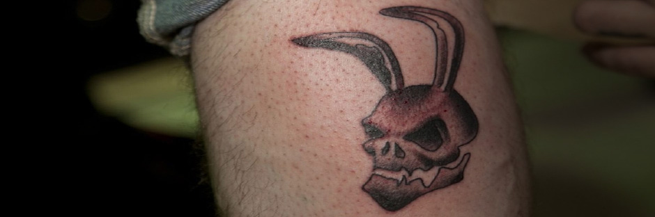 A player with a Guristas tattoo on his arm.
